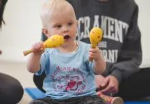 Baby with maracas at a Monkey Music class