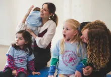 happy parents and children enjoying a Monkey Music class