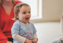 Young child having fun at a Monkey Music class