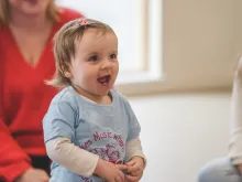 Young child having fun at a Monkey Music class